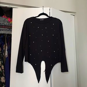 Long sleeve black top with pearl and tie details